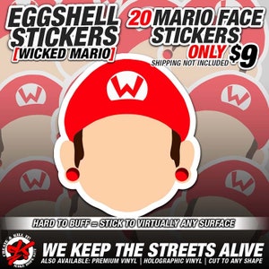 May include: A set of 20 eggshell stickers featuring a stylized Mario face with a red cap and a white 'W' on the front. The text 'EGGSHELL STICKERS [WICKED MARIO] 20 MARIO FACE STICKERS ONLY $9 SHIPPING NOT INCLUDED' is visible in the image. The text 'HARD TO BUFF = STICK TO VIRTUALLY ANY SURFACE WE KEEP THE STREETS ALIVE ALSO AVAILABLE: PREMIUM VINYL | HOLOGRAPHIC VINYL | CUT TO ANY SHAPE' is also visible in the image.