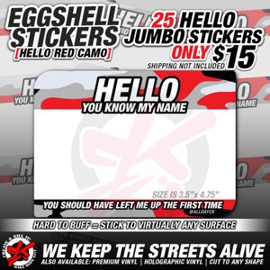 May include: A white sticker with a red, white, and gray camouflage pattern. The sticker says "Hello You Know My Name" and "You Should Have Left Me Up The First Time". The sticker is 3.5 inches by 4.75 inches.