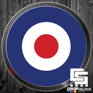 May include: A round, blue, white, and red target design with a black and white dotted border. The design features a red circle in the center, surrounded by white and blue concentric circles. The image includes the text "COLOR FULL COLOR SUB SUBLIMATION PRINTING".