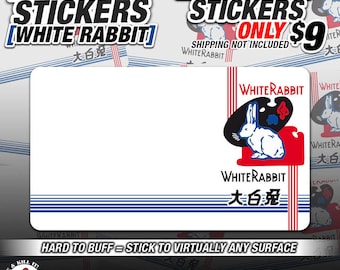 May include: A pack of 25 eggshell stickers featuring a white rabbit with the text "White Rabbit" and "大白兔" in red and blue. The stickers are hard to buff and can be applied to virtually any surface. The text "We Keep The Streets Alive" is also included.