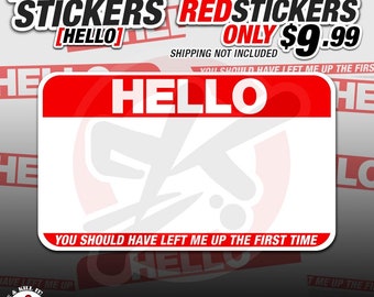 May include: A pack of 25 red vinyl stickers with the text "HELLO" in white. The stickers are shaped like a name tag with the text "YOU SHOULD HAVE LEFT ME UP THE FIRST TIME" below the "HELLO". The text "EGGSHELL STICKERS [HELLO]" is in the top left corner of the image. The text "25 HELLO REDSTICKERS ONLY $9.99" is in the top right corner of the image. The text "SHIPPING NOT INCLUDED" is below the price. The text "WE KEEP THE STREETS ALIVE" is at the bottom of the image. The text "ALSO AVAILABLE: PREMIUM VINYL | HOLOGRAPHIC VINYL | CUT TO ANY SHAPE" is below the text "WE KEEP THE STREETS ALIVE".