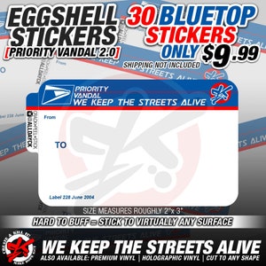 May include: A white sticker with blue and red accents. The sticker has the text "Priority Vandal" and "We Keep The Streets Alive". The sticker is approximately 2 inches by 3 inches.