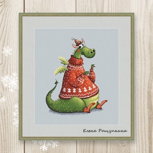 May include: A green dragon wearing a red Christmas sweater with a white snowflake pattern and a green Santa hat. The dragon is sitting on a light blue background. The text "Elena Rozhutkina" is at the bottom of the image.
