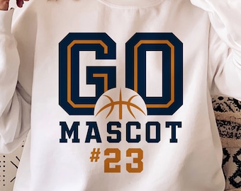 May include: White sweatshirt with a navy blue and gold graphic that says "GO" with a basketball in the middle and "MASCOT #23" underneath.