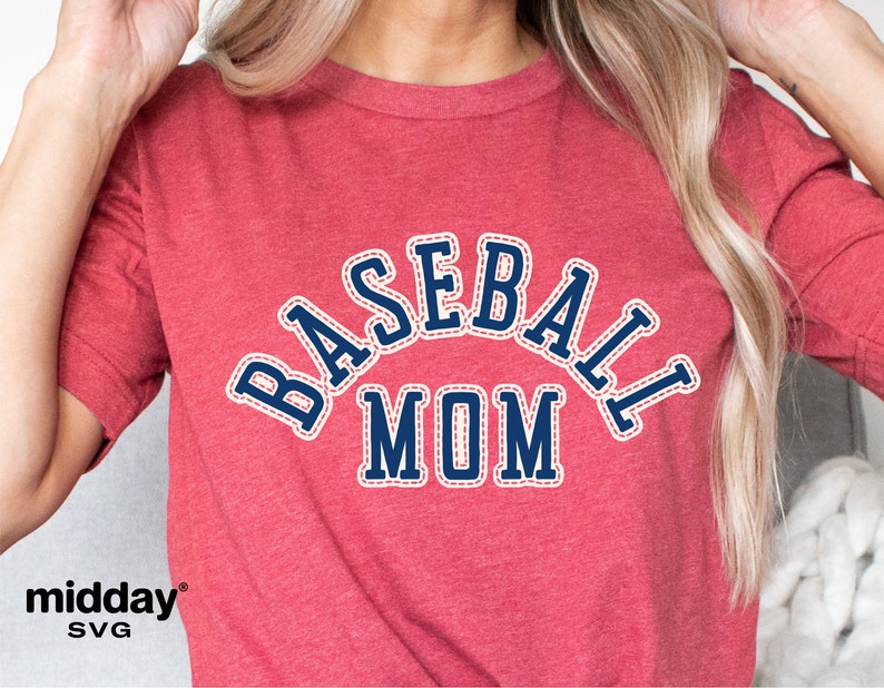 May include: Red t-shirt with a blue stitched design that says "Baseball Mom".