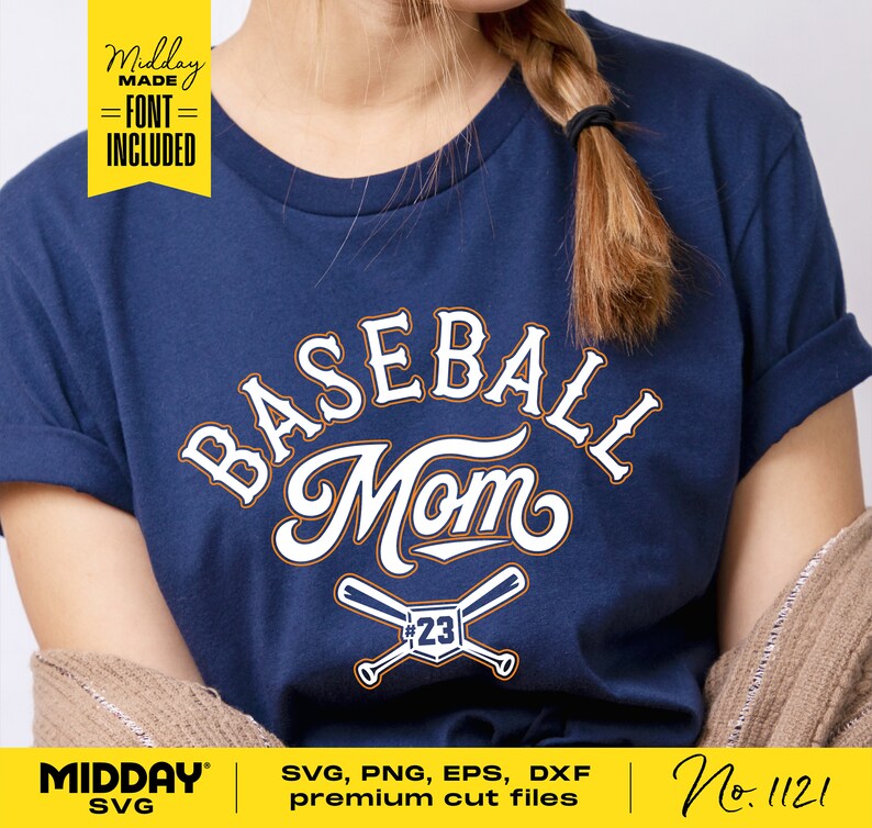 May include: A navy blue t-shirt with the text "BASEBALL Mom" in white with a baseball bat and ball graphic with the number 23. The text "Midday MADE =FONT= INCLUDED" is in a yellow banner at the top left of the image.