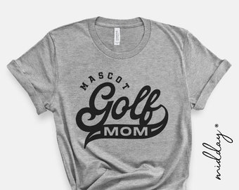 May include: Gray t-shirt with black text that reads "Mascot Golf Mom" in a stylized font.