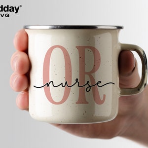 May include: A white enamel mug with a pink "OR nurse" design. The mug has a black handle and a speckled finish.