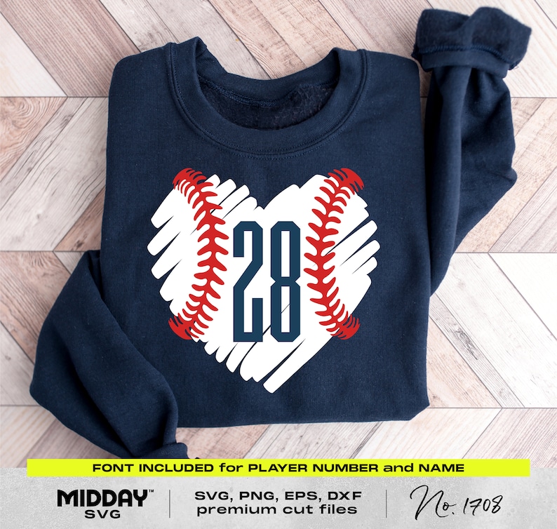 May include: A navy blue sweatshirt with a white heart-shaped baseball design. The baseball has red stitching and the number "28" in the center. The text "FONT INCLUDED for PLAYER NUMBER and NAME" is at the bottom of the image. The text "MIDDAY SVG" is in the lower left corner. The text "SVG, PNG, EPS, DXF premium cut files" is in the lower center. The text "No. 1708" is in the lower right corner.