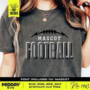 May include: A gray t-shirt with a black and white graphic design that says "MASCOT FOOTBALL" with a football graphic above the text. The text "FONT INCLUDED for MASCOT" is below the graphic. The text "MIDDAY SVG" is in the bottom left corner and the text "No. 1743" is in the bottom right corner.