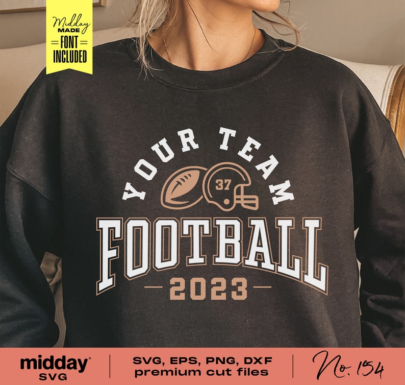 May include: A black sweatshirt with a brown and white graphic design that says "Your Team Football - 2023". The graphic includes a football and a helmet.