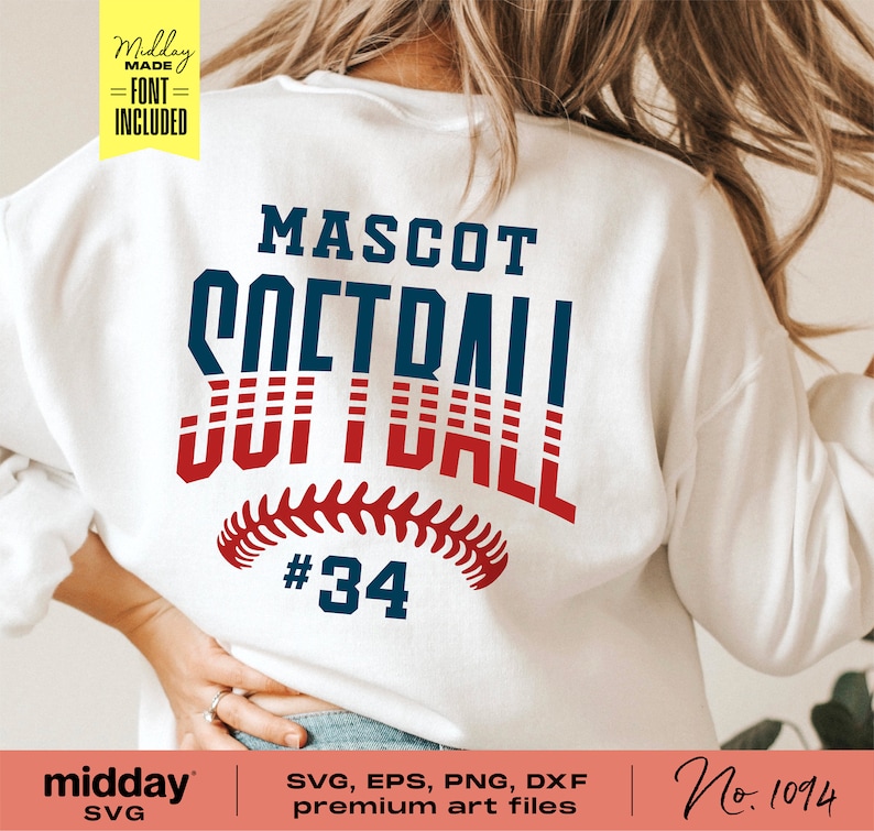May include: White sweatshirt with a red, white, and blue softball design. The text "MASCOT SOFTBALL" is in a vintage style font. The number "34" is below the softball design.