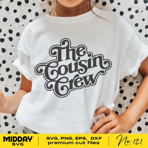 May include: A white t-shirt with black text that reads "The Cousin Crew" in a retro font style.