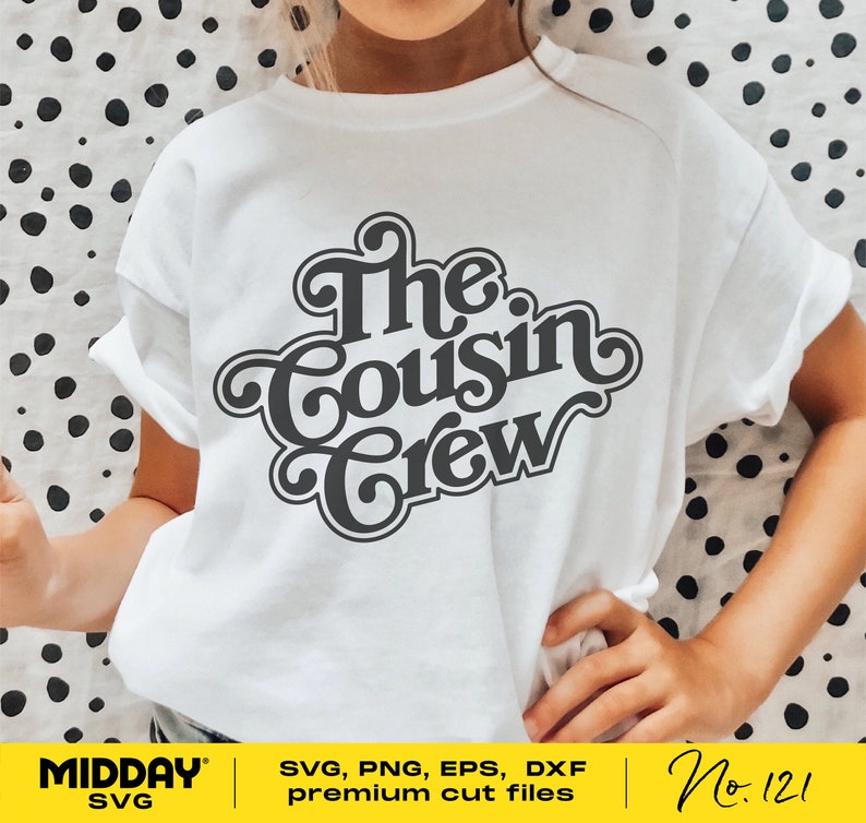 May include: A white t-shirt with black text that reads "The Cousin Crew" in a retro font style.