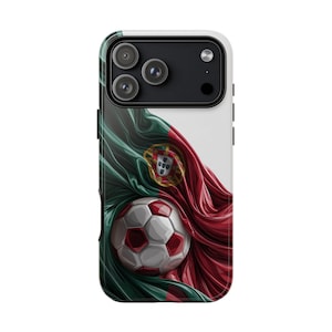 May include: A smartphone case featuring a graphic design of a soccer ball set against a flowing, draped fabric pattern in the green and red colors of the Portuguese flag, complete with the central national coat of arms emblem displayed prominently.