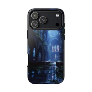 May include: Black phone case featuring a digital art print of a cathedral interior. The image shows a gothic-style building with arched windows, stained glass, and a reflective floor. The scene is bathed in blue light, creating a moody atmosphere.