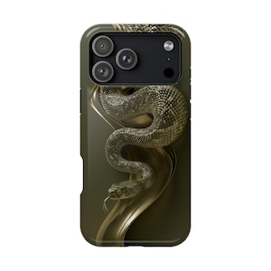 May include: A smartphone case featuring a detailed graphic of a coiled snake with textured scales in shades of olive green and gold. The snake is positioned against a dark, flowing background, with its head and forked tongue visible at the bottom.