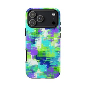 May include: A colorful phone case with a vibrant abstract design. The case features a mix of blue, green, purple, and white brushstrokes. The phone case has a black camera module with three lenses.