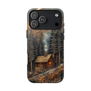 May include: A phone case featuring a detailed forest scene with a log cabin nestled among tall pine trees. Smoke rises from the cabin's chimney, and the case has a textured, three-dimensional appearance. The case is designed to fit a smartphone.