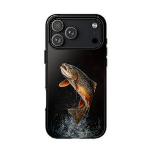May include: A black smartphone case featuring a detailed illustration of a brook trout leaping out of water. The fish displays orange, yellow, and dark green scales with white-spotted patterns, set against a dark background with water splashes.