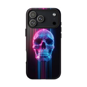 May include: Black phone case with a neon skull design. The skull is in pink and blue, with vertical light streaks. The case has a glossy finish and a black border, with three camera lenses.