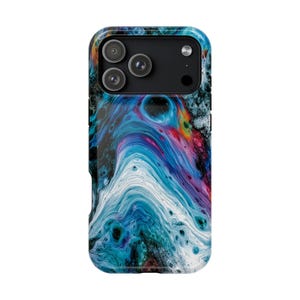May include: A smartphone case featuring a vibrant fluid acrylic pour design with swirling patterns of deep blue, turquoise, white, magenta, and black. The case has a rectangular cutout at the top for a triple camera system and a flash.