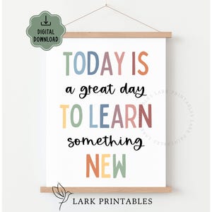 May include: A white poster with the text "TODAY IS a great day TO LEARN something NEW" in various colours. The poster is held by wooden magnetic poster hangers. A green "DIGITAL DOWNLOAD" badge is in the upper left corner.