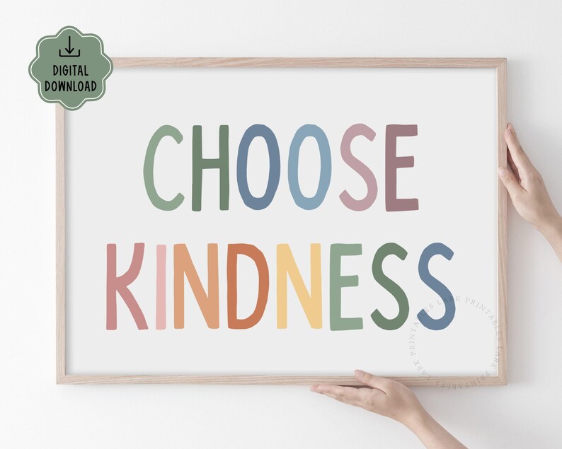 May include: A framed print with the text "CHOOSE KINDNESS" in rainbow colors. The letters are stylized and have a playful, hand-drawn look.