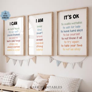 May include: Three framed prints with inspirational messages. The first says "I CAN" with phrases like "do hard things" and "believe in myself." The second says "I AM" with words like "loved" and "brave." The third says "IT'S OK" with phrases like "to make mistakes."