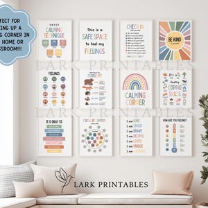 May include: A collection of framed educational posters with text and colorful graphics. The posters cover topics like calming techniques, feelings, coping skills, and self-affirmations. The text includes "Calming Corner" and "Be Kind."