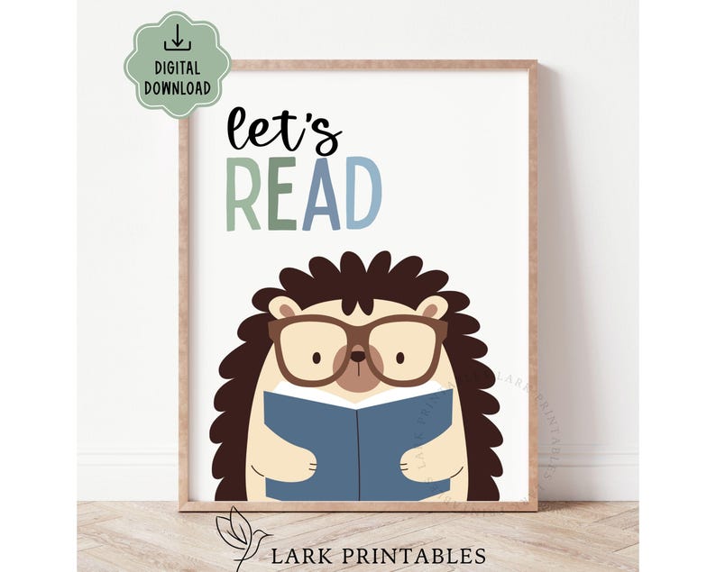 May include: A framed print featuring a cartoon hedgehog wearing glasses and reading a blue book. The words "let's READ" are displayed above the hedgehog in green and blue lettering. The print is a digital download.