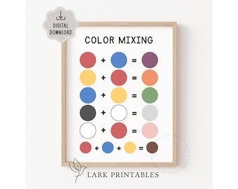 May include: A framed print titled "COLOR MIXING" with a light wood frame. The print displays color combinations using red, yellow, blue, black, white, and brown circles. The text "DIGITAL DOWNLOAD" is in the upper left corner, and "LARK PRINTABLES" is at the bottom.