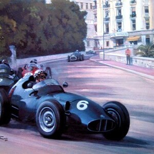 May include: A vintage racing car with the number 6 on the side, painted in a dark blue color, is speeding down a road. The car is in the foreground of the image, with a building and palm trees in the background.