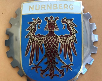 NURNBERG GERMANY AUTOMOBILE GRILLE BADGE 