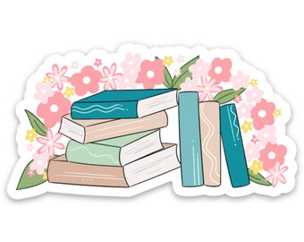May include: A sticker featuring a stack of books in various colors, including teal, beige, and green, with white wavy lines. Pink and yellow flowers and green leaves surround the books, creating a floral and literary theme.