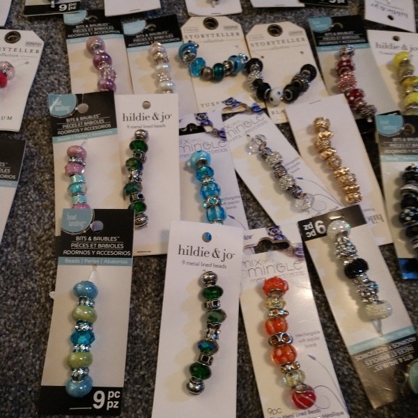 New Glass and Metal Lined Beads 9 Per Pack Many Colors Random Picks.