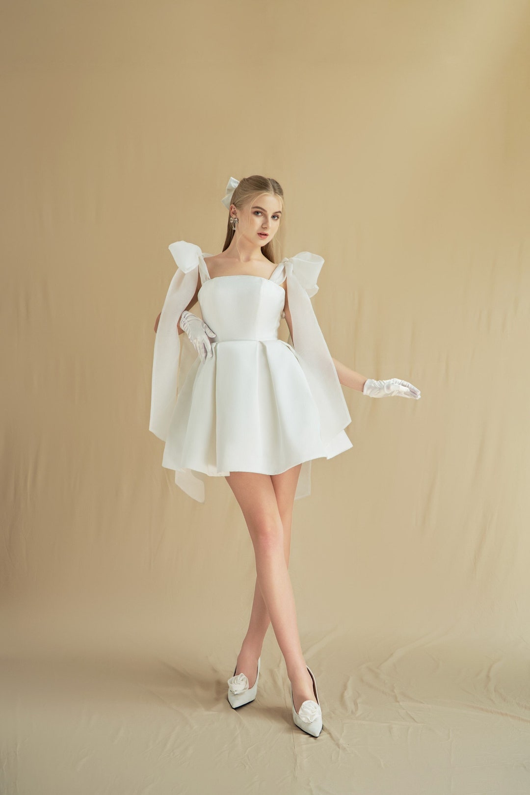 Trendy White Mini Short Wedding Dress with an Open Back for a Bold and Fashion-Forward Look