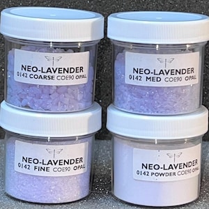 May include: Four small jars of purple iridescent glass glitter labeled "NEO-LAVENDER" with different sizes: "COARSE", "MED", "FINE", and "POWDER".