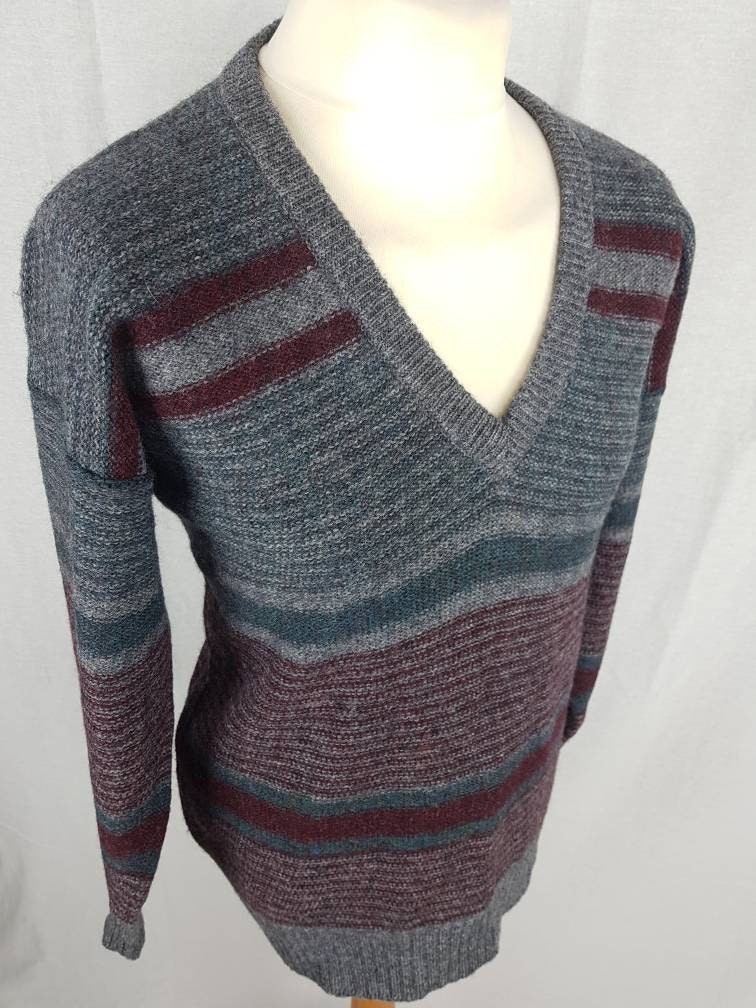 Grey sweater with red stripe sale