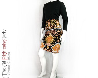 Vintage jurk jaren 60/70, maat 14, psychedelisch, op-art, geometrisch, oranje en mosterd, jurken jaren 70, jurken jaren 60, vintage jurken jaren 60, kleuren jaren 70