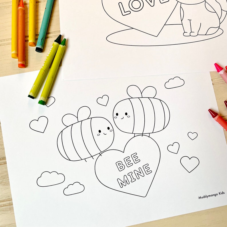 May include: A black and white coloring page featuring two cartoon bees with hearts and clouds. The bees are holding a heart-shaped candy with the text "BEE MINE".