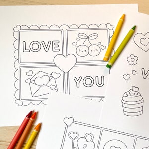 May include: Black and white coloring page with a Valentine's Day theme. The page features a heart, a cherry, an envelope, and the words "LOVE" and "YOU".