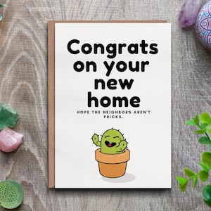 Gefeliciteerd, nieuwe thuiskaart: grappige nieuwe buren zijn geen prikkaart. Leuke housewarmingwenskaart met cactusillustratie.