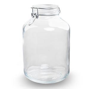 Pode incluir: Um frasco de vidro transparente com fecho de metal. O frasco está vazio e tem uma boca larga.