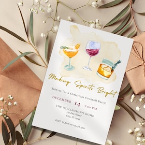 May include: Invitation to a Christmas cocktail party with the text "Making Spirits Bright" and the date "December 14, 7:00 PM". The invitation includes the location "The Williamson's Home" and the address "123 Any Street, City, ST 12345". The invitation also includes an RSVP to Kate at 123.456.7890.