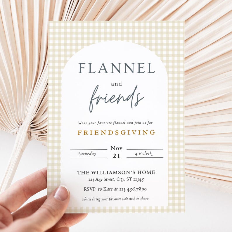 May include: A beige and white gingham patterned invitation card with a white arch and the text "FLANNEL and friends" in black and blue. The text "FRIENDSGIVING" is in gold. The invitation is for a Friendsgiving party on Saturday, November 21st at 4 o'clock at The Williamson's Home, 123 Any Street, City, ST 12345. The RSVP information is to Kate at 123.456.7890. The invitation requests guests to bring their favorite side dish to share.