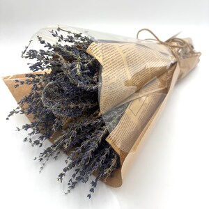 May include: A bouquet of dried lavender flowers wrapped in brown paper and tied with twine.