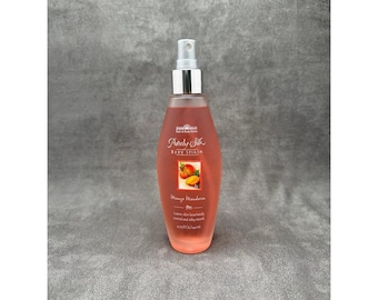 Gel de baño Purely Silk de Vintage Bath & Body Works, aroma a mango y mandarina.