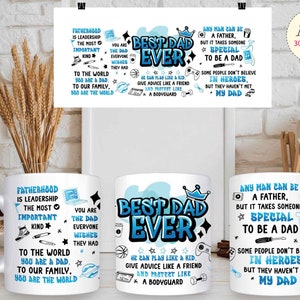 Puede incluir: Dos tazas blancas con texto e ilustraciones azules y negras. El texto en las tazas dice "Best Dad Ever" y "La paternidad es liderazgo".