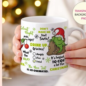 May include: White ceramic mug with a green Grinch character and Christmas-themed text. The text includes "Silent Night", "Drink Up, Grinches!" and "The Nice List is so overrated."